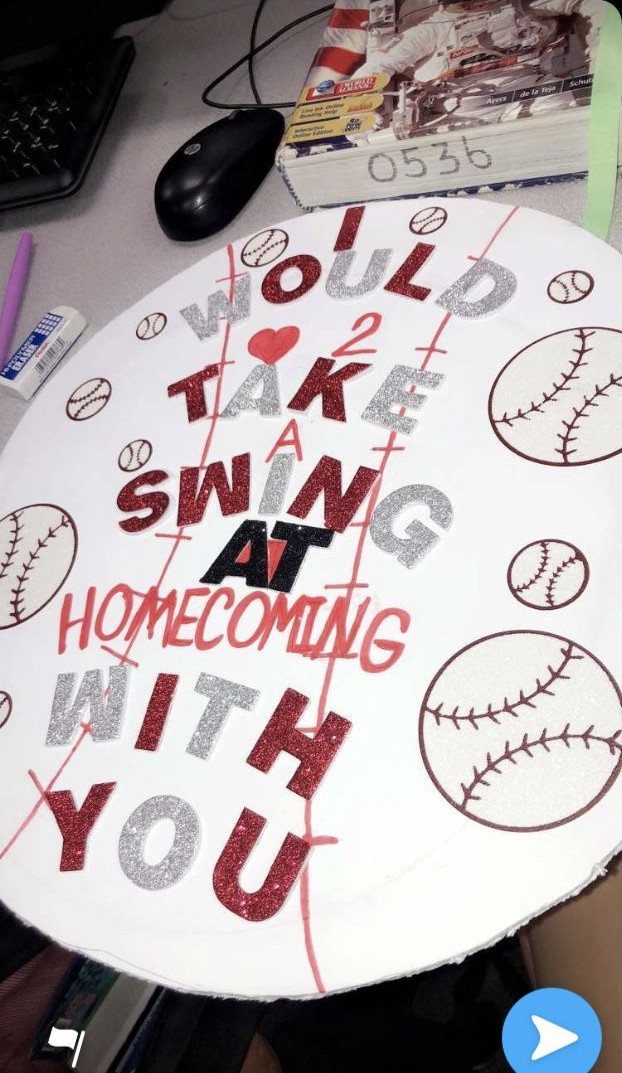 Home plate shaped cardboard sign with baseball puns asking someone to homecoming.