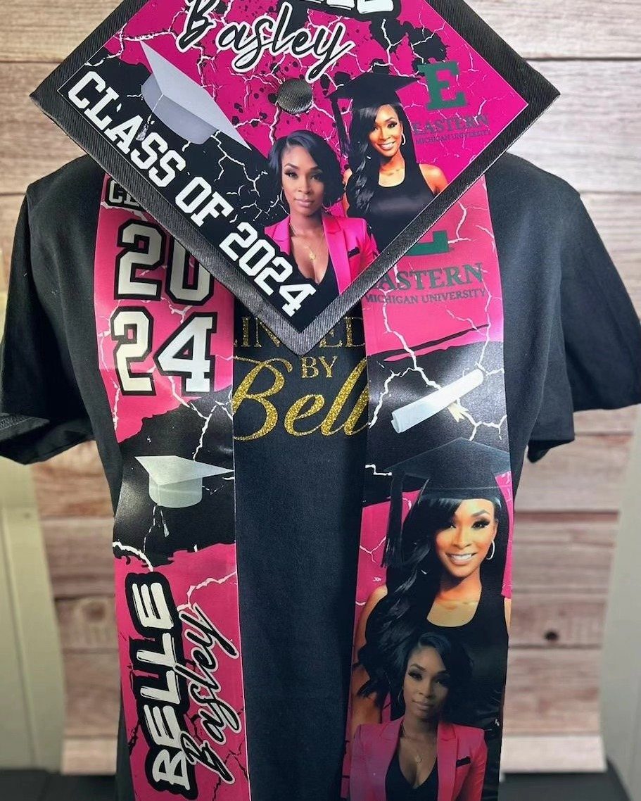 Decorated graduation cap and stole with pink accents and photos on black shirt