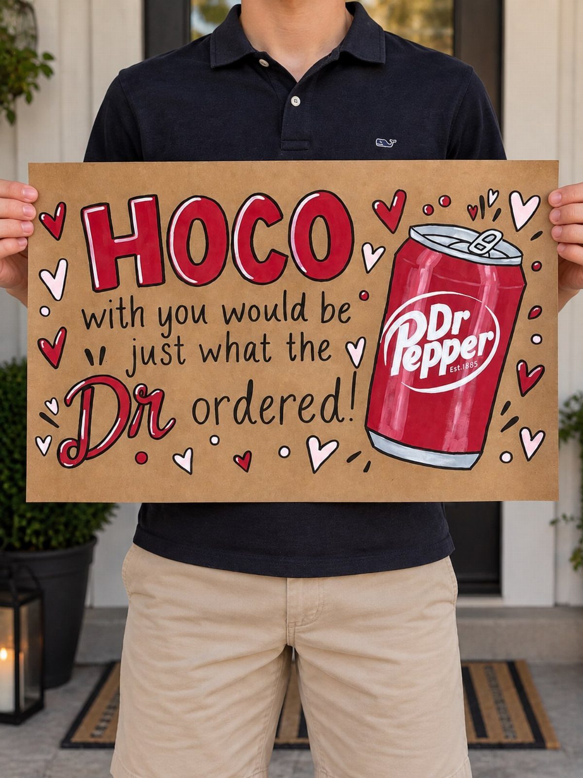 Person holding a cardboard homecoming proposal sign with a Dr Pepper pun