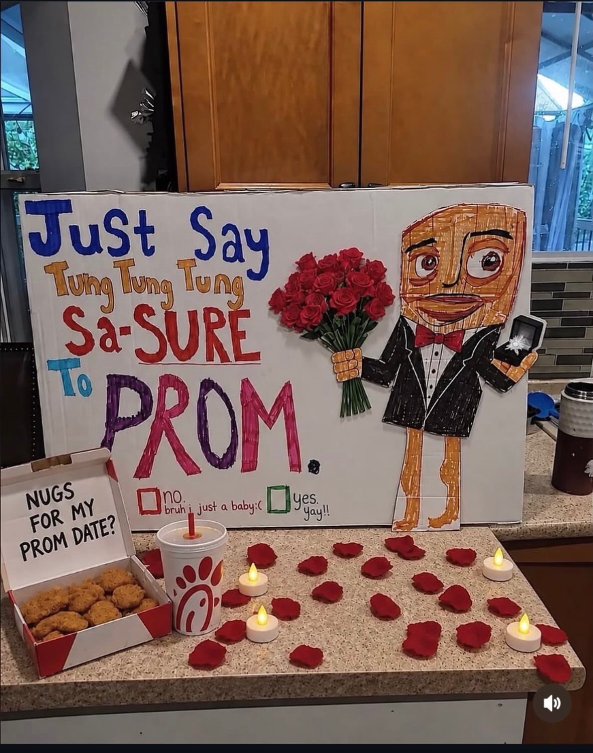 Handmade promposal poster with cartoon character, chicken nuggets, and candles on a counter