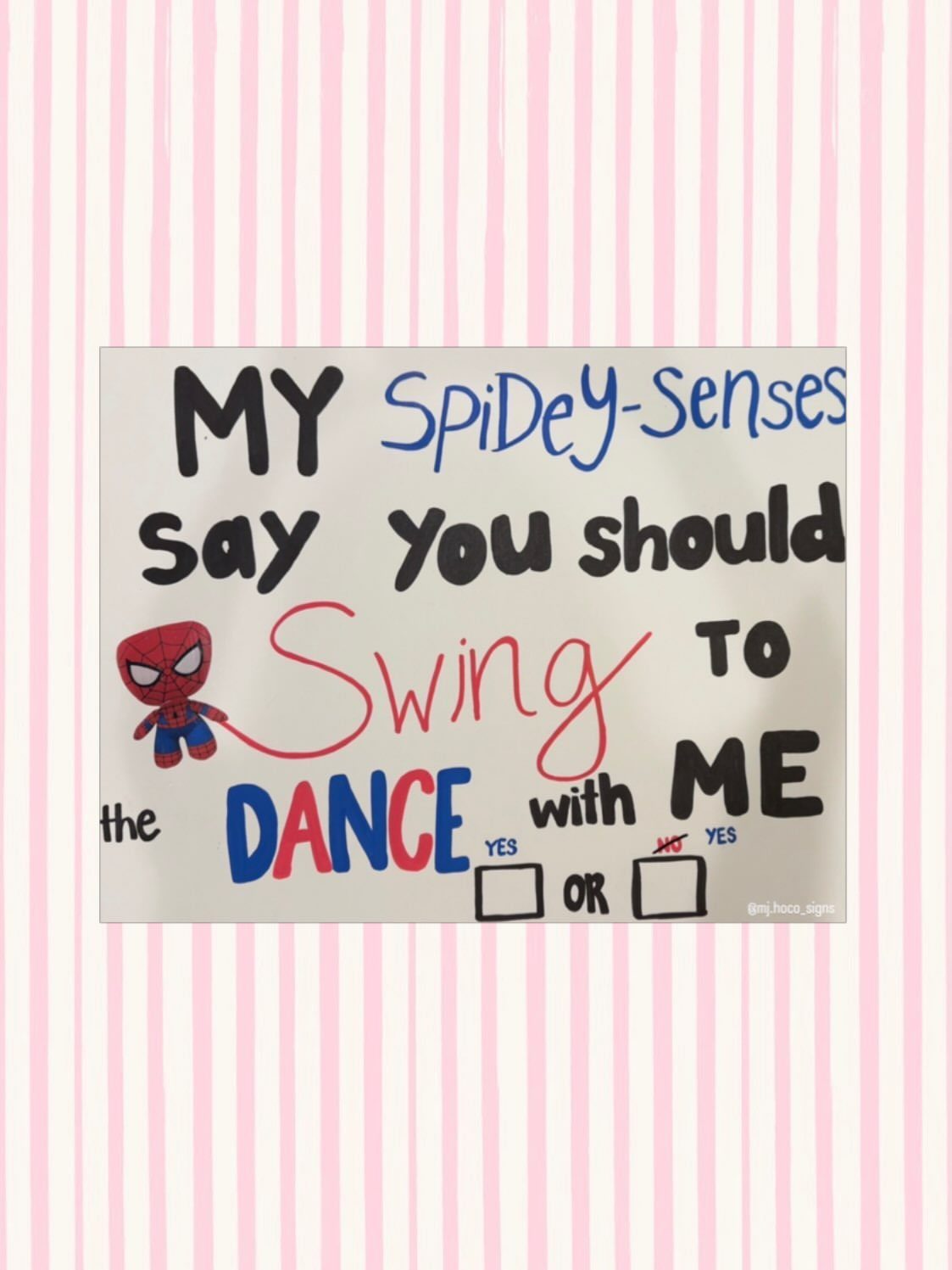Hand-drawn homecoming poster featuring Spider-Man and a pun about swinging to the dance.