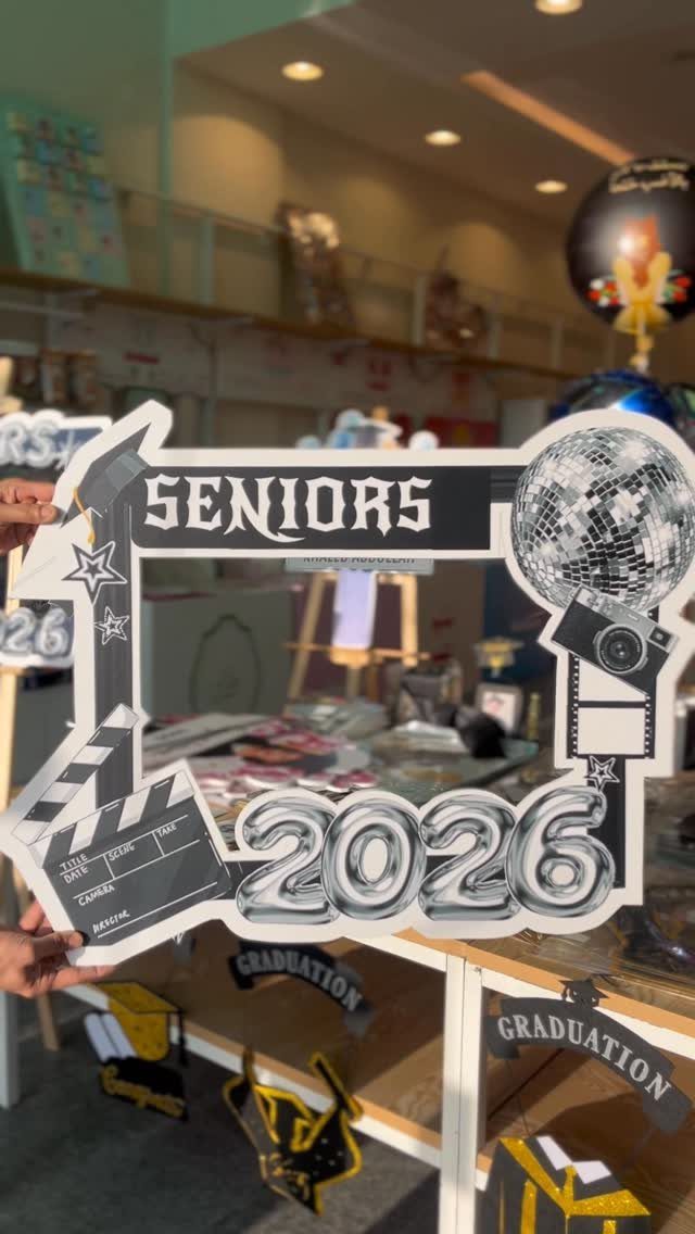Custom graduation photo frame prop with Seniors 2026 text and disco ball design