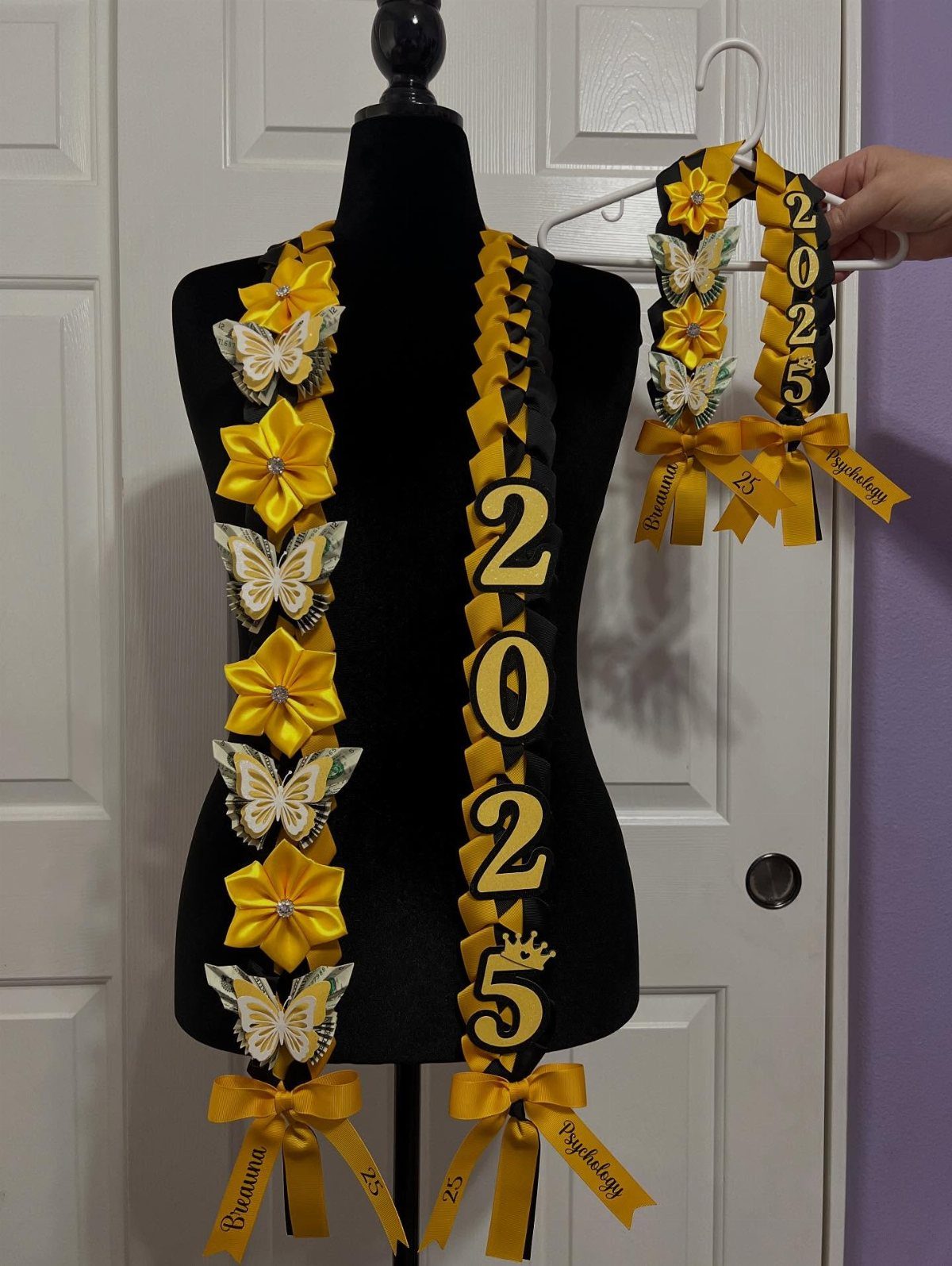 Graduation stole and lei in yellow and black with butterflies and 2025 lettering