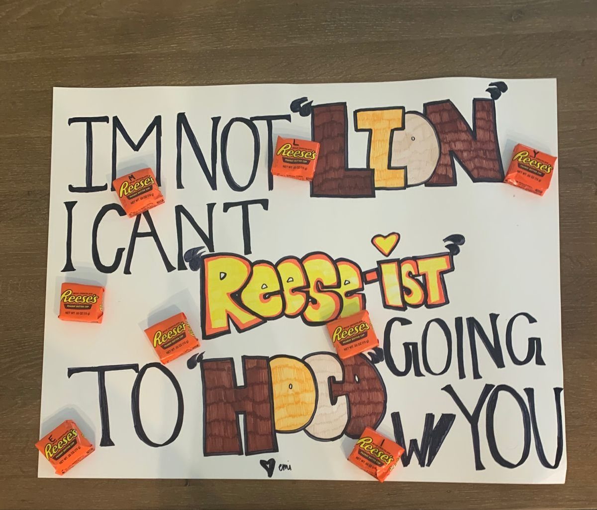 Homecoming proposal poster with Reese's candy bars and colorful hand-drawn lettering.