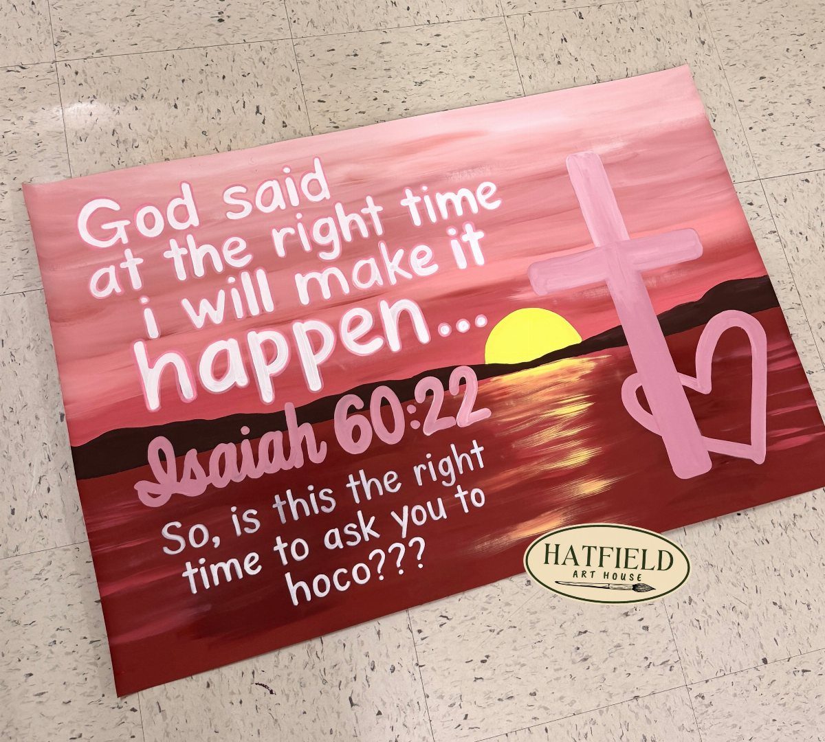 Painted homecoming asking poster with a sunset, cross, and religious quote.