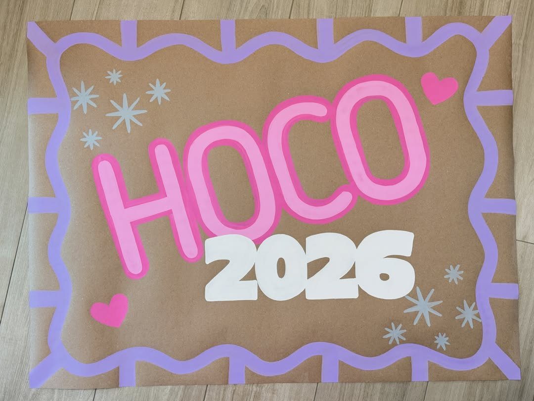 Brown paper homecoming poster with pink HOCO 2026 text and purple wavy border.