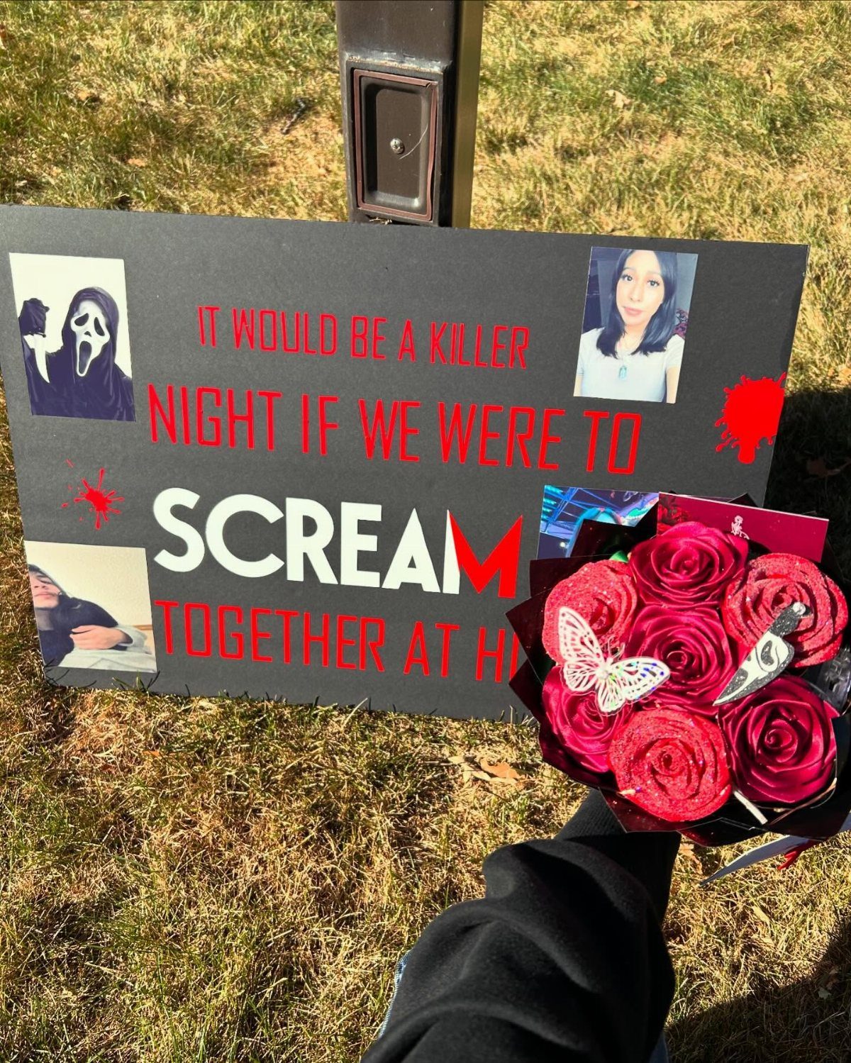 Black homecoming proposal sign with Scream movie theme and a bouquet of red roses